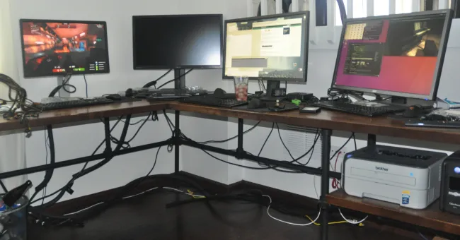 The Custom Phoronix Desks Are Still Holding Up One Year Later