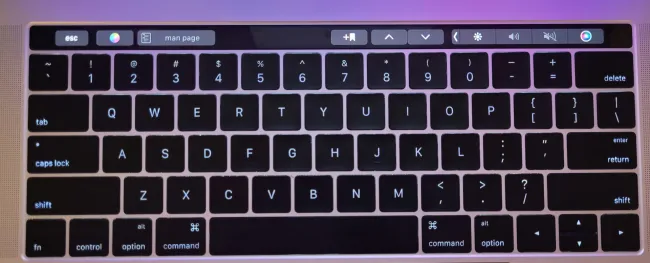 Apple MacBook Pro with Touch Bar keyboard.